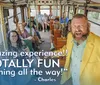 A jovial man in a yellow jacket is enthusiastically addressing passengers in a trolley-style vehicle with a quote bubble indicating a positive and amusing experience as passengers in the background exhibit a mix of smiles and neutral expressions