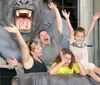 The image depicts the Hollywood Wax Museum distinguished by its large HOLLYWOOD sign and a wax figure of King Kong climbing the building