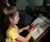 Young Girl at the Dinosaur Museum